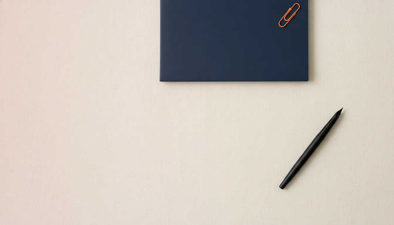 Navy folder, paperclip and pen — Elitez EOR keeps your employment paperwork clean and minimal.